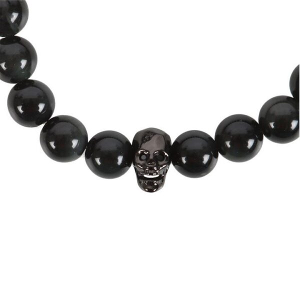2026/07/1000174650.jpg Pulsera de obsidiana negra con calavera